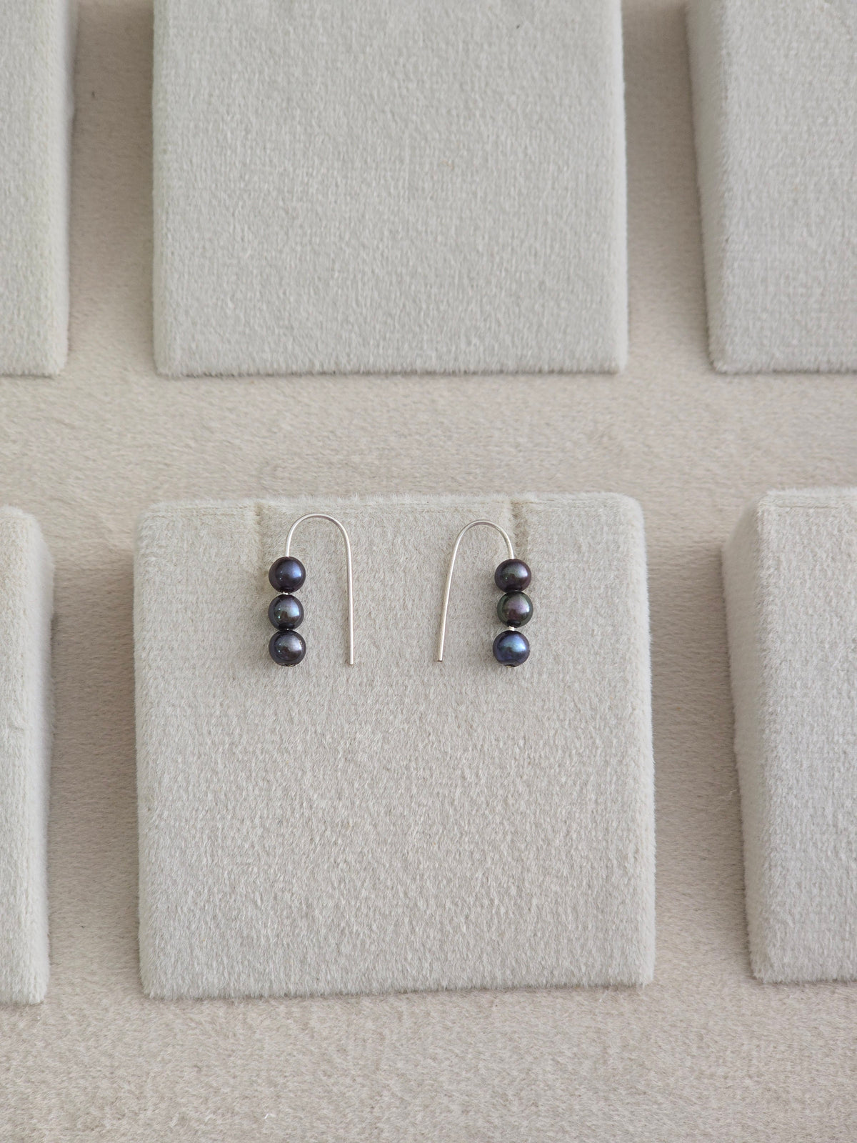 Black pearl stud-dangler earrings